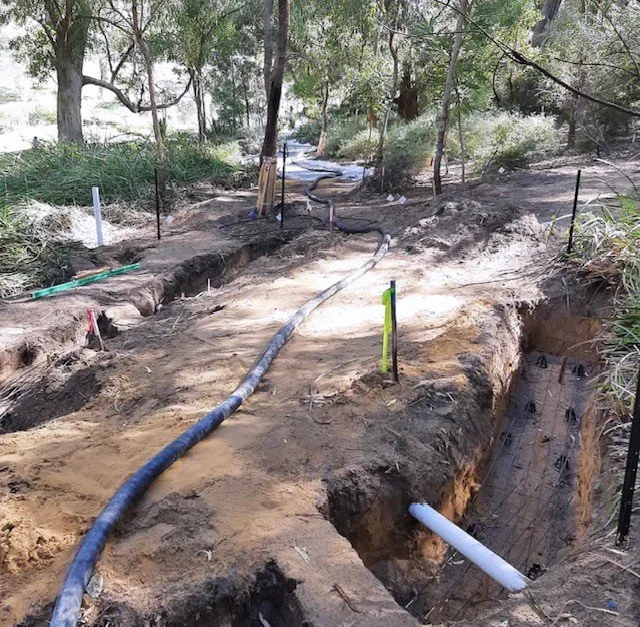 Concrete line pump hose on commercial job site Perth WA