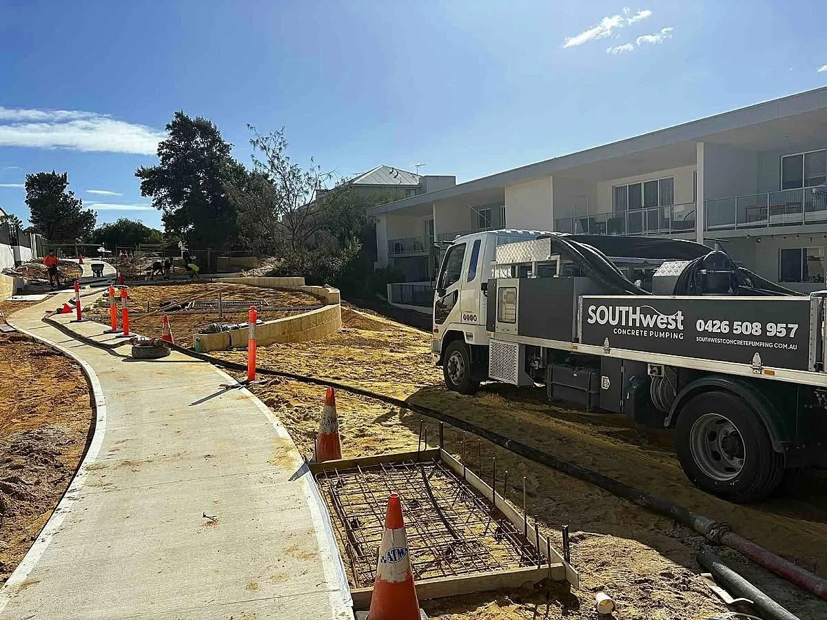 SWCP pump operator completing a footpath pour in Perth Western Australia