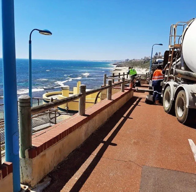 Concrete line pump hose on commercial job site Perth WA