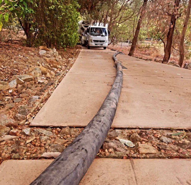 Concrete line pumping in progress Perth residential slab