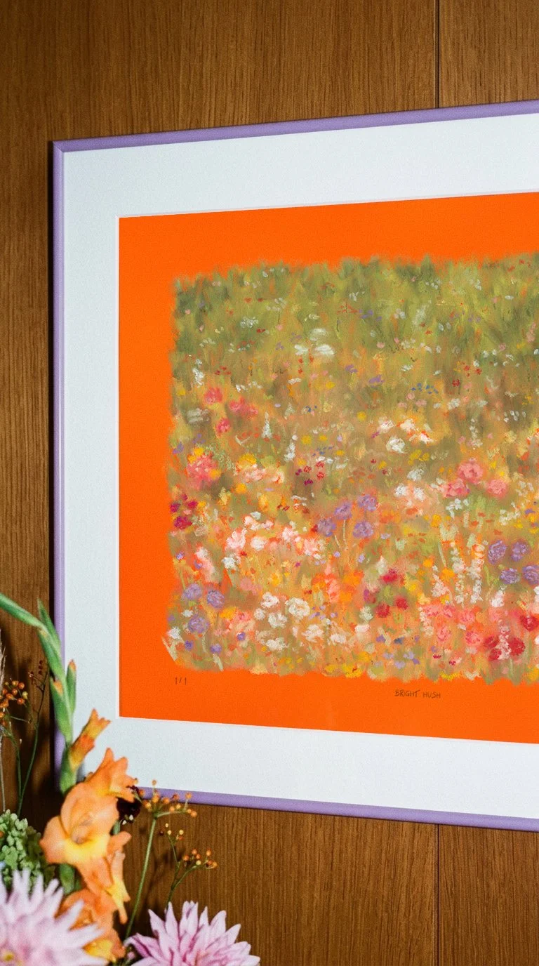 A colorful oil pastel painting with a floral pattern, framed in purple, small artist seattle