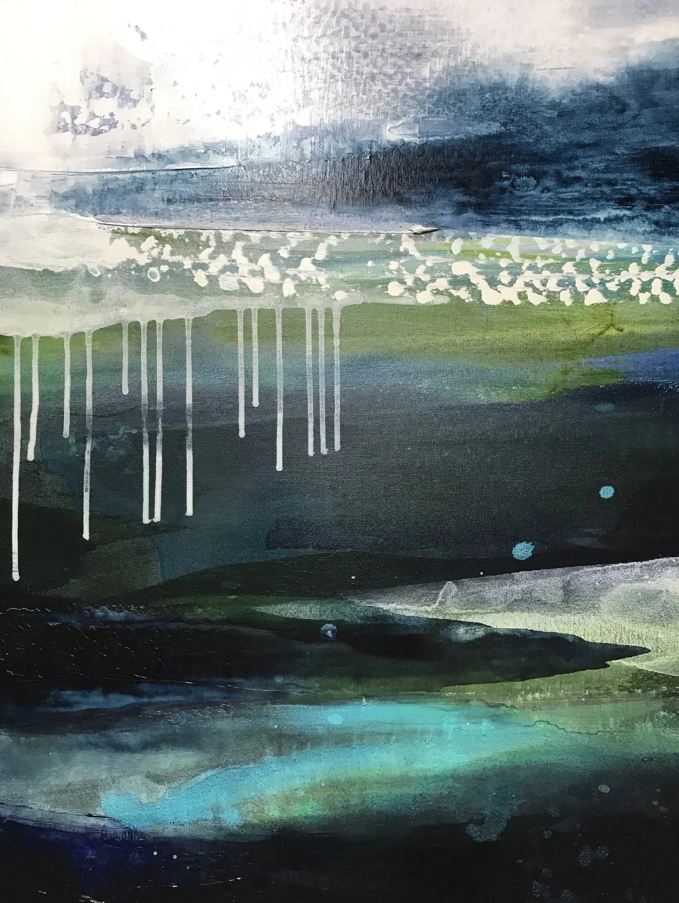 Abstract watercolor painting with shades of blue, green, black, and white, featuring drips, splashes, and textured layers.