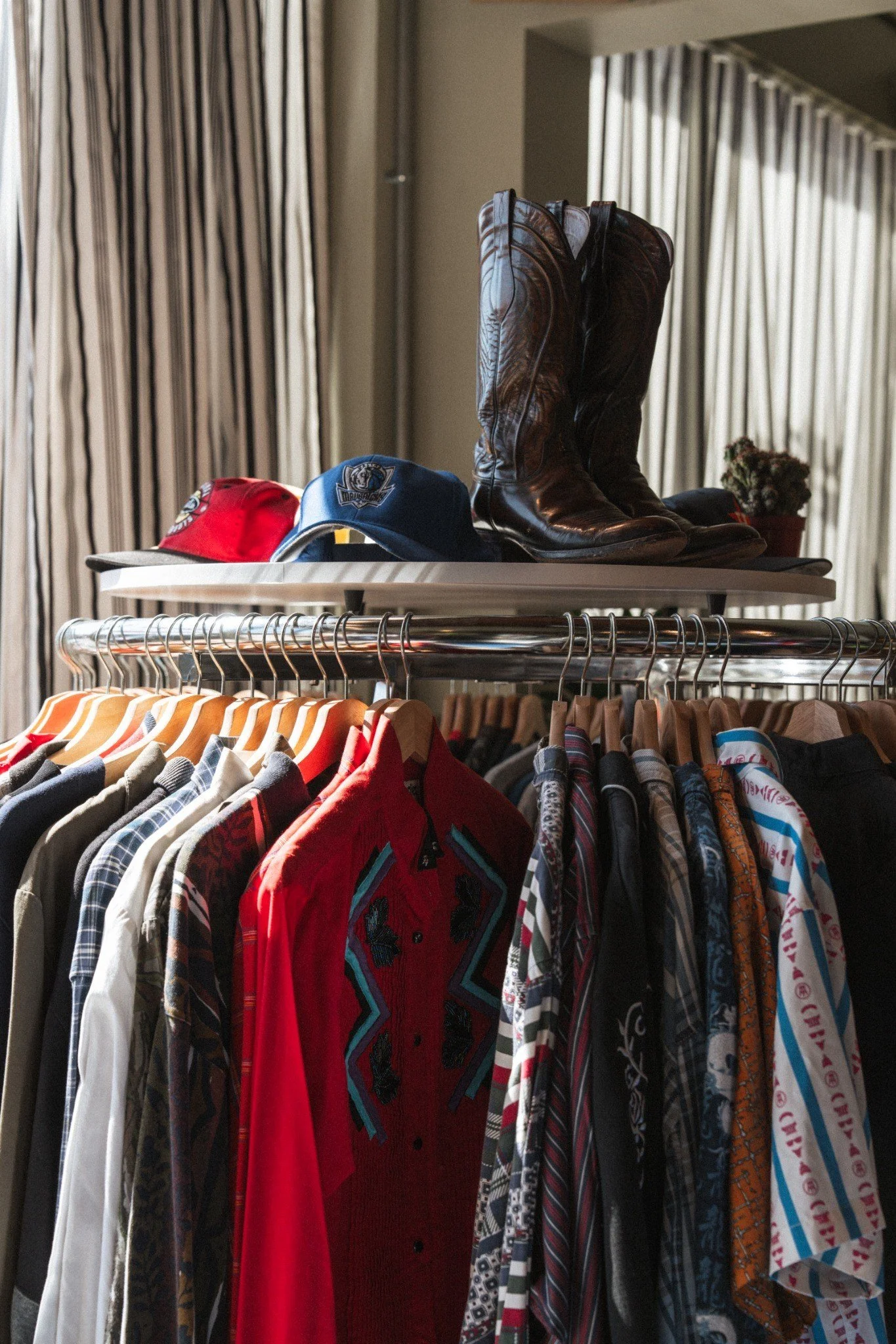 Curated vintage clothing and western wear available at Fort Worth Barbershop in Near Southside.