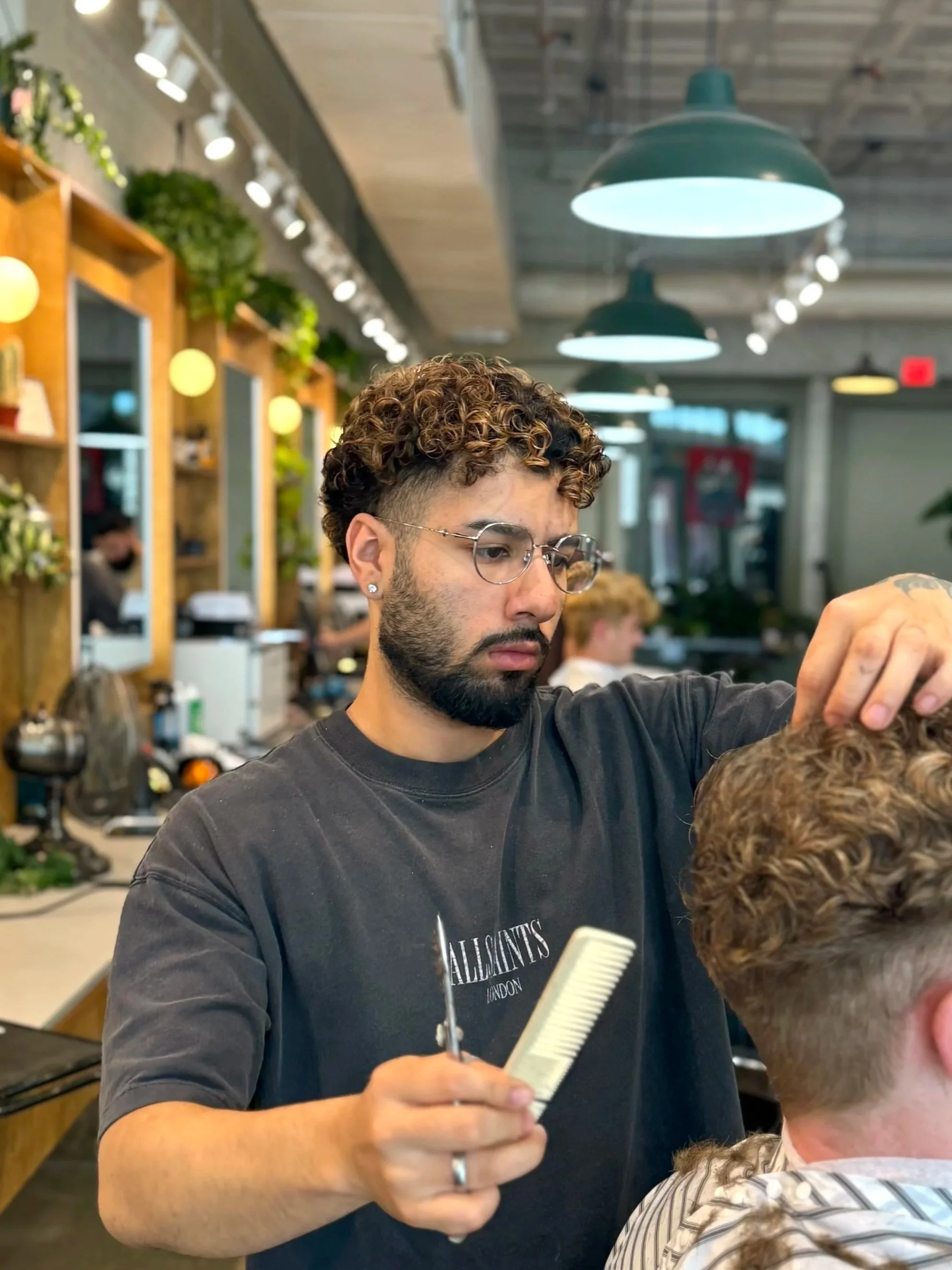 Gonzo Franco Fort Worth Barber Shop barber cutting hair