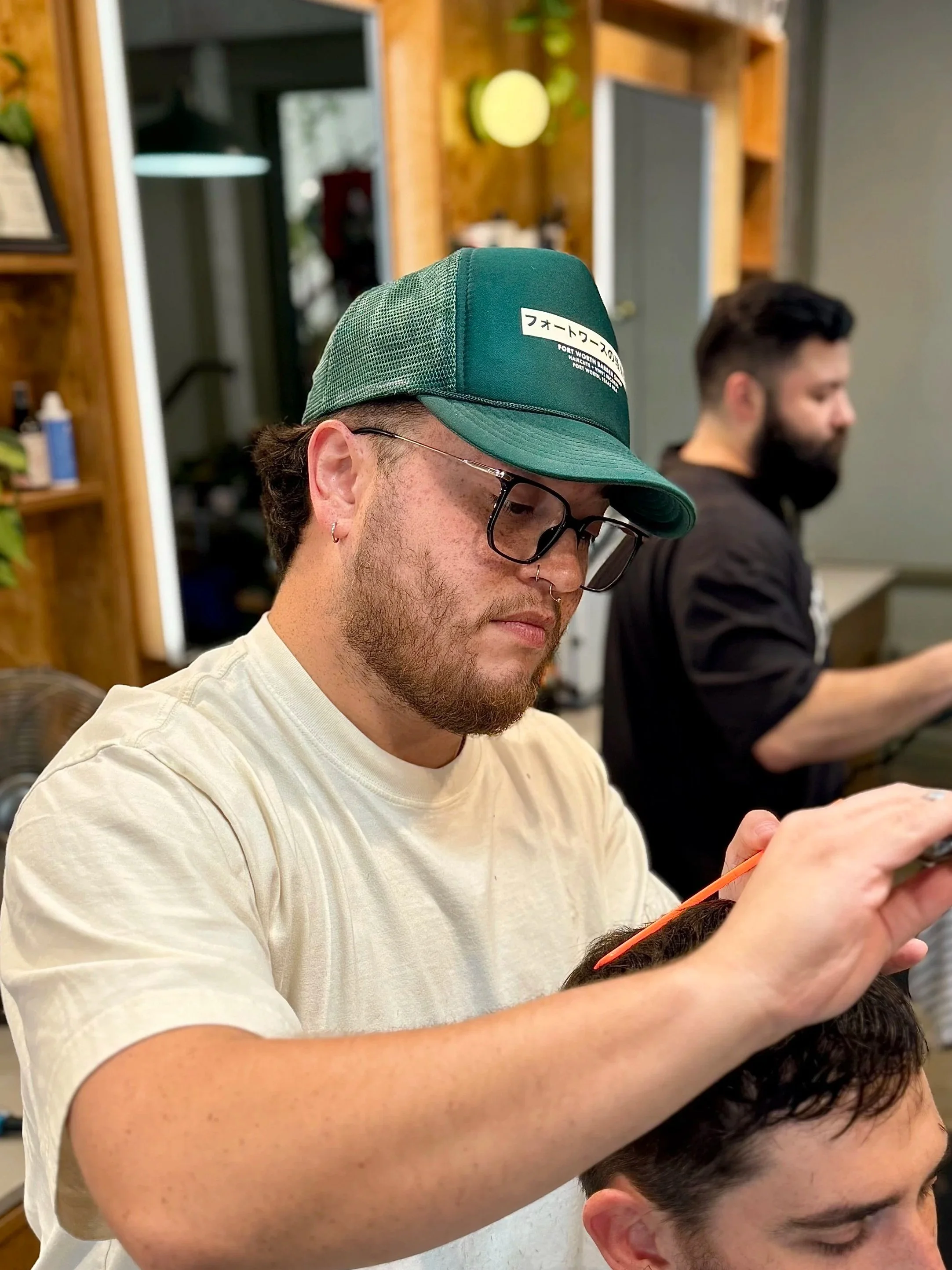 Jazz Partida Fort Worth Barber Shop barber cutting hair
