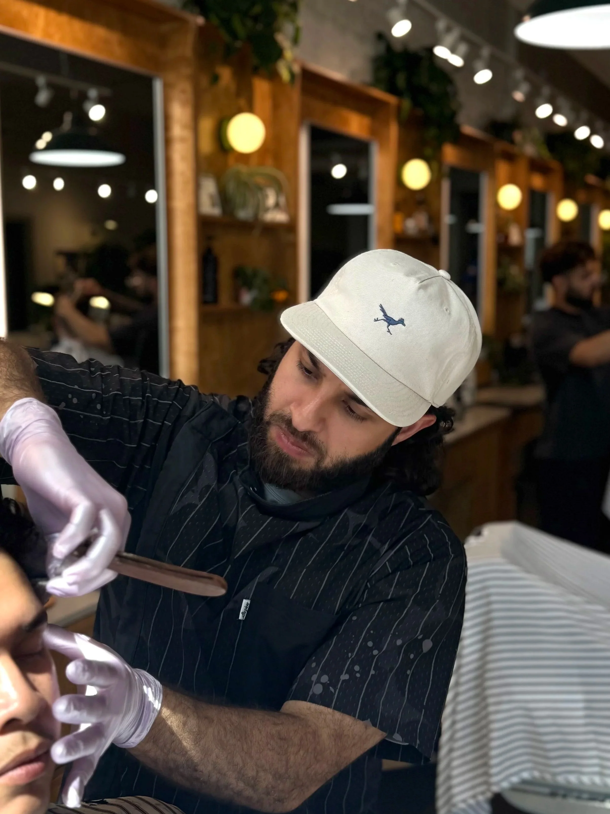 Jose Romero Fort Worth Barber Shop barber cutting hair