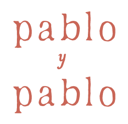 Text reading 'Pablo y Pablo' in pink font on a black background.