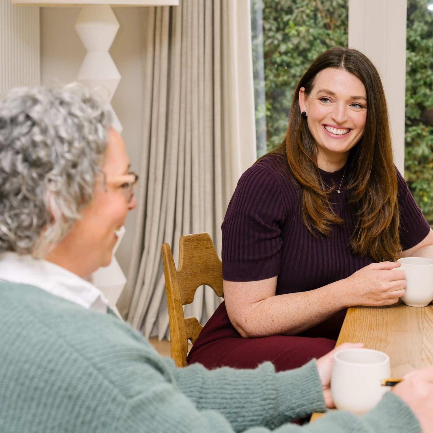 Hannah from Small Circle having a relaxed career strategy conversation with a client.