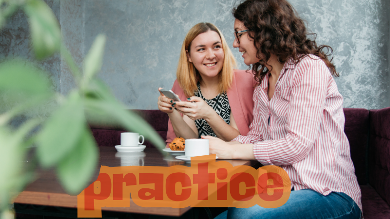 Two women in a café smiling, one holding a phone. Coffee cups and pastries on the table. Large orange text "practice" overlaps the image.