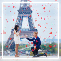 Man proposing on one knee to woman by Eiffel Tower. Heart confetti in air. Romantic, joyful mood with soft colors and white border.