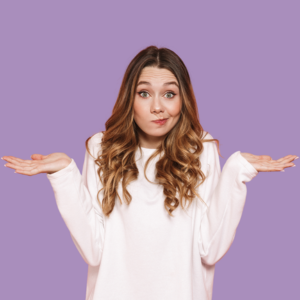 Woman in a white sweater shrugging with palms up, expressing confusion. Purple background. Brown hair, subtle smile.
