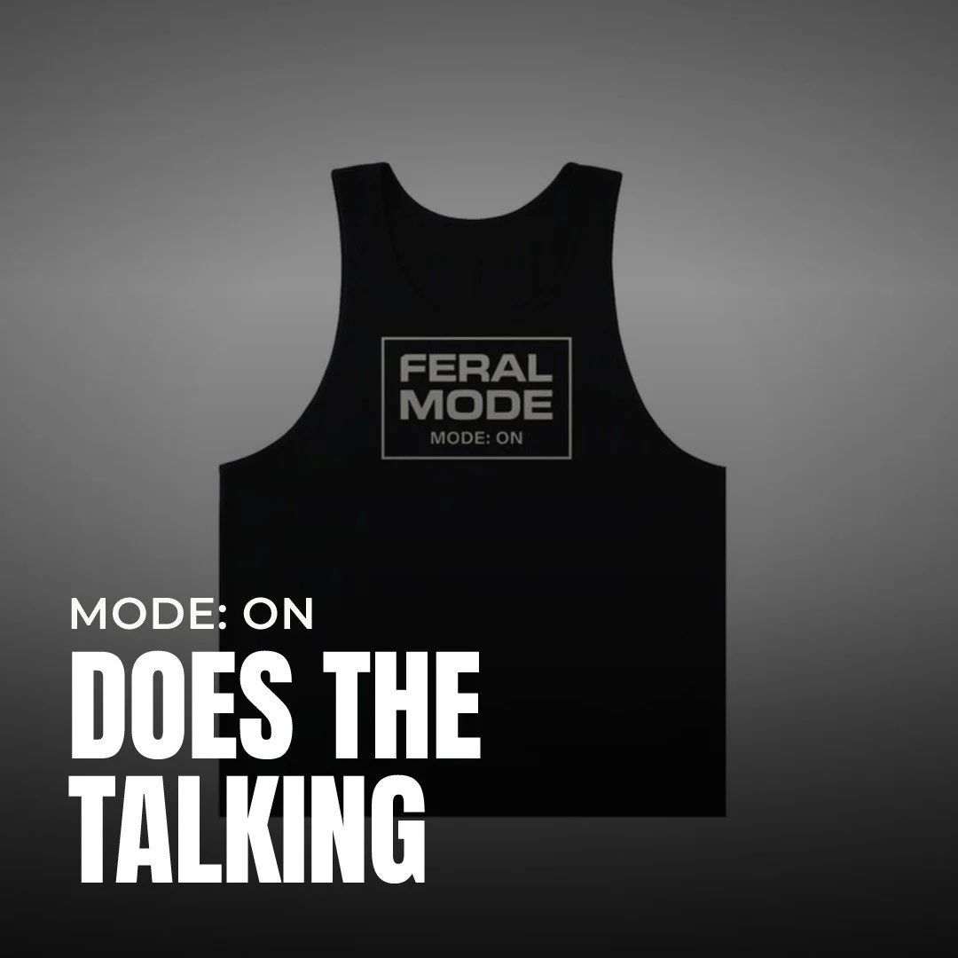 The shirt speaks first. You just show up.

MODE: ON printed on black. Two words that start a conversation before you open your mouth.

You wear it out. Someone clocks it. That's the point.

Tag us in your fit and we'll feature you next in the communi