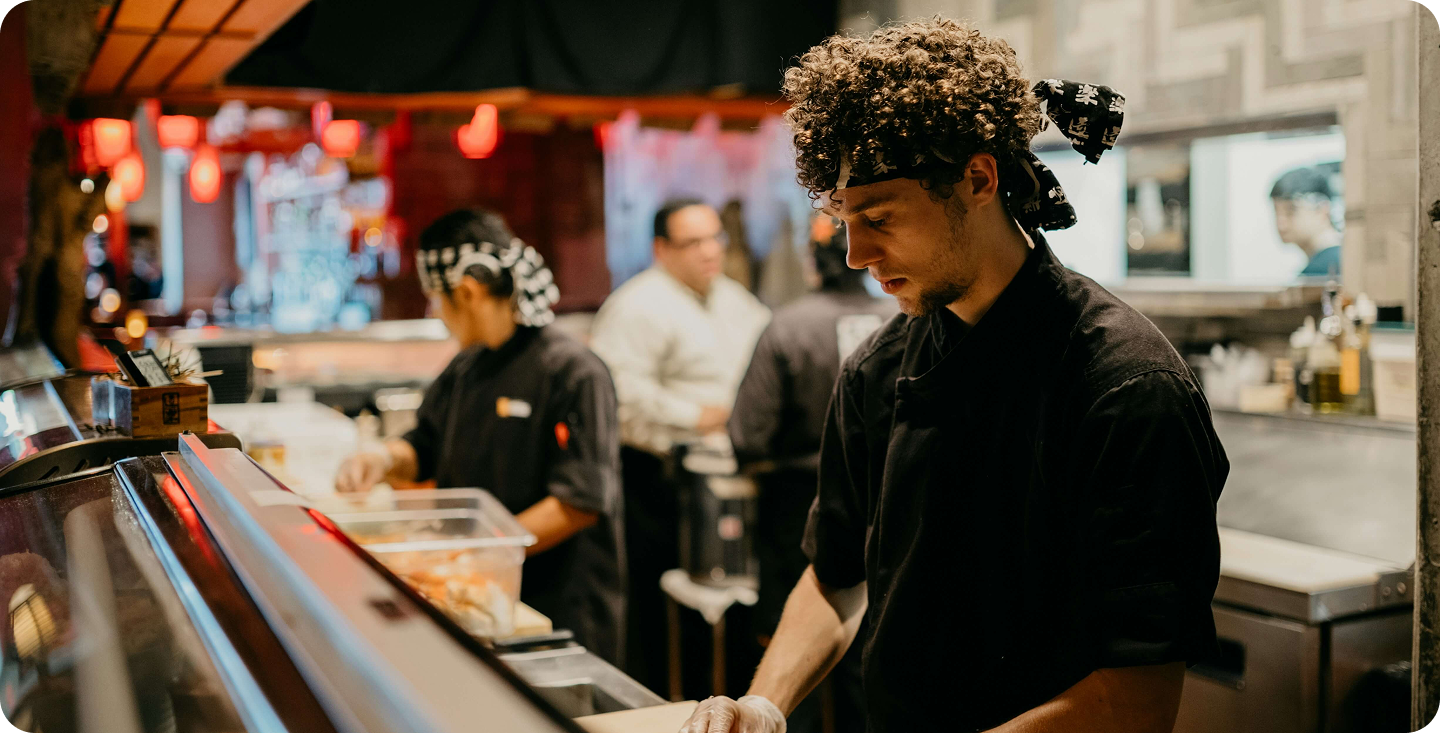 Head chef running the pass in a premium Melbourne restaurant kitchen