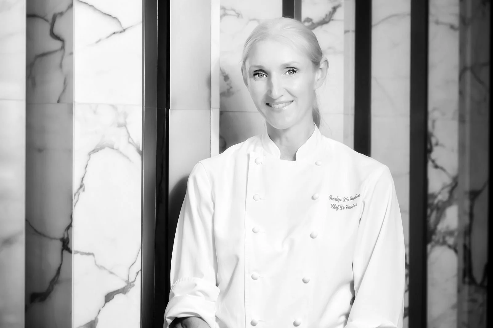 Cake artist Penelope d’Arcy Graham in her chef’s whites.