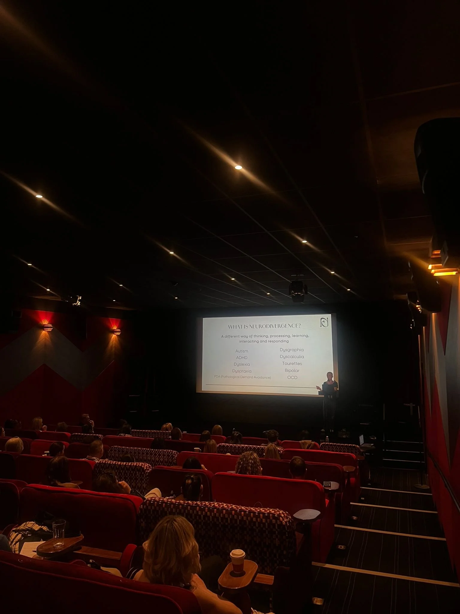 Sam Margaritis speaking at an event