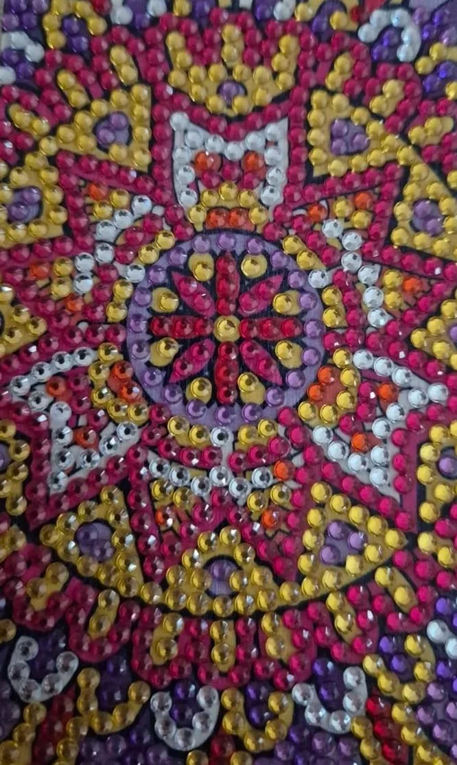 Close-up of a colorful diamond art piece