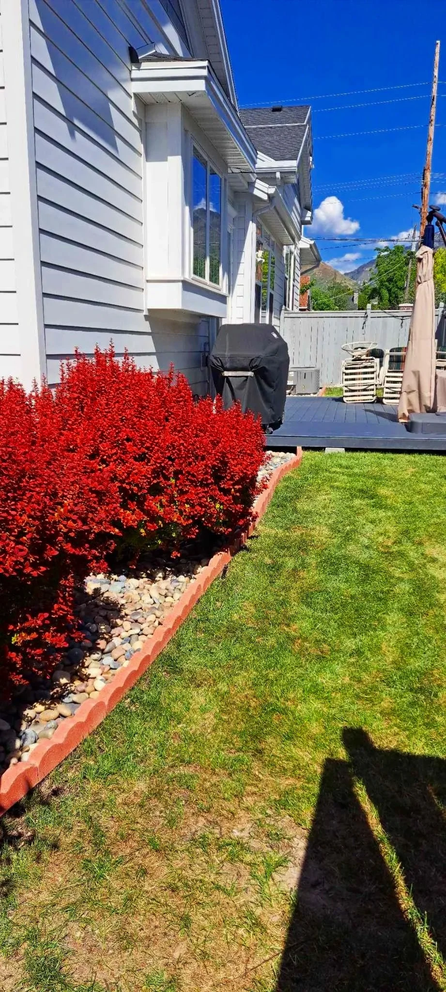 Decorative pebble and rock landscaping installation in Salt Lake City, Utah, by L and B Landscaping