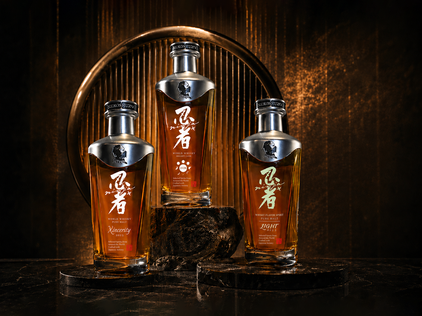 Three bottles of Ninja World Whisky on a black marble surface, with a dark gold background and semicircular metallic framework behind them.