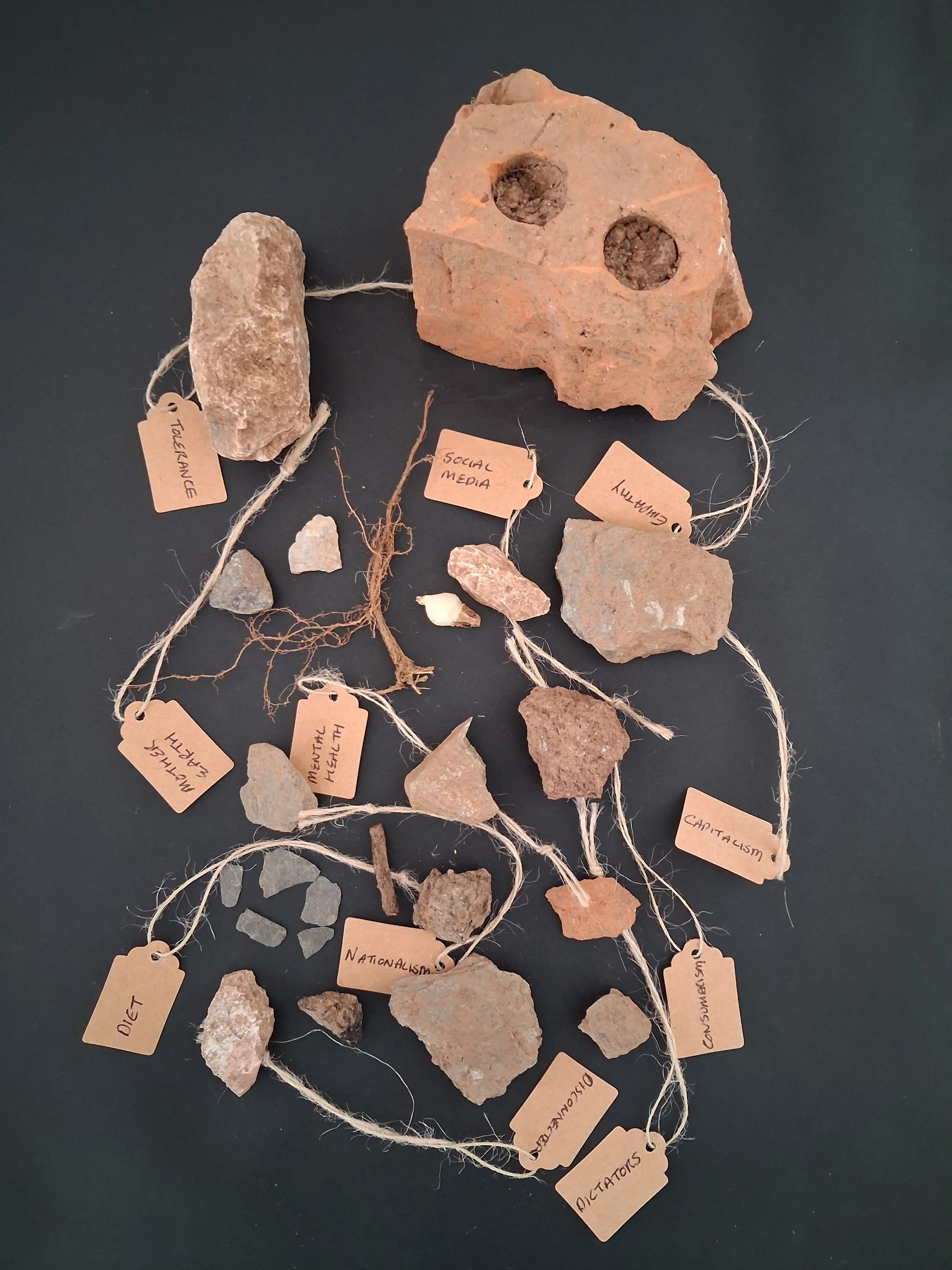 Untitled, 2026, dug for objects, labels and ink