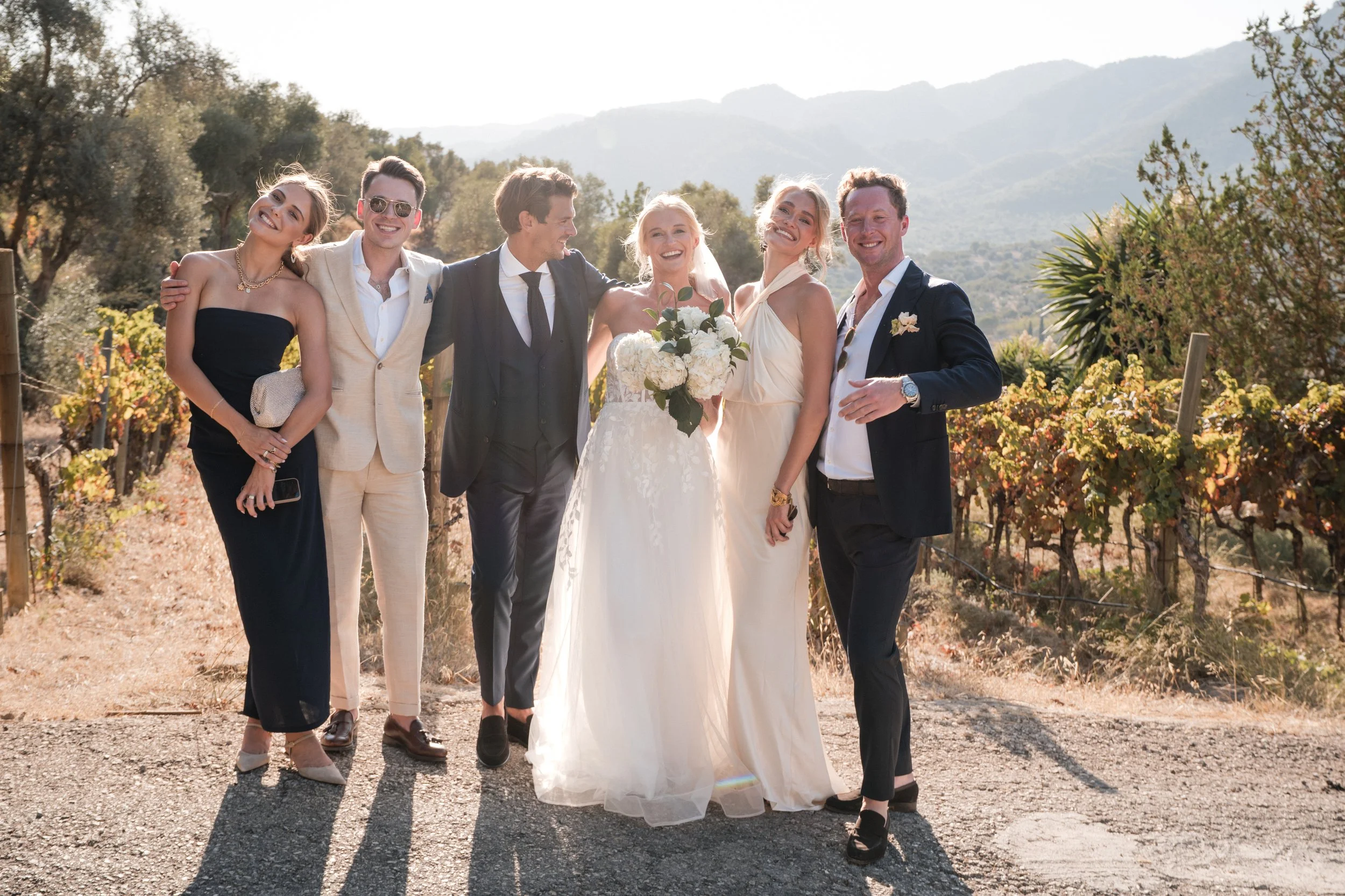 Wedding group portrait at vineyard Mallorca – documentary style