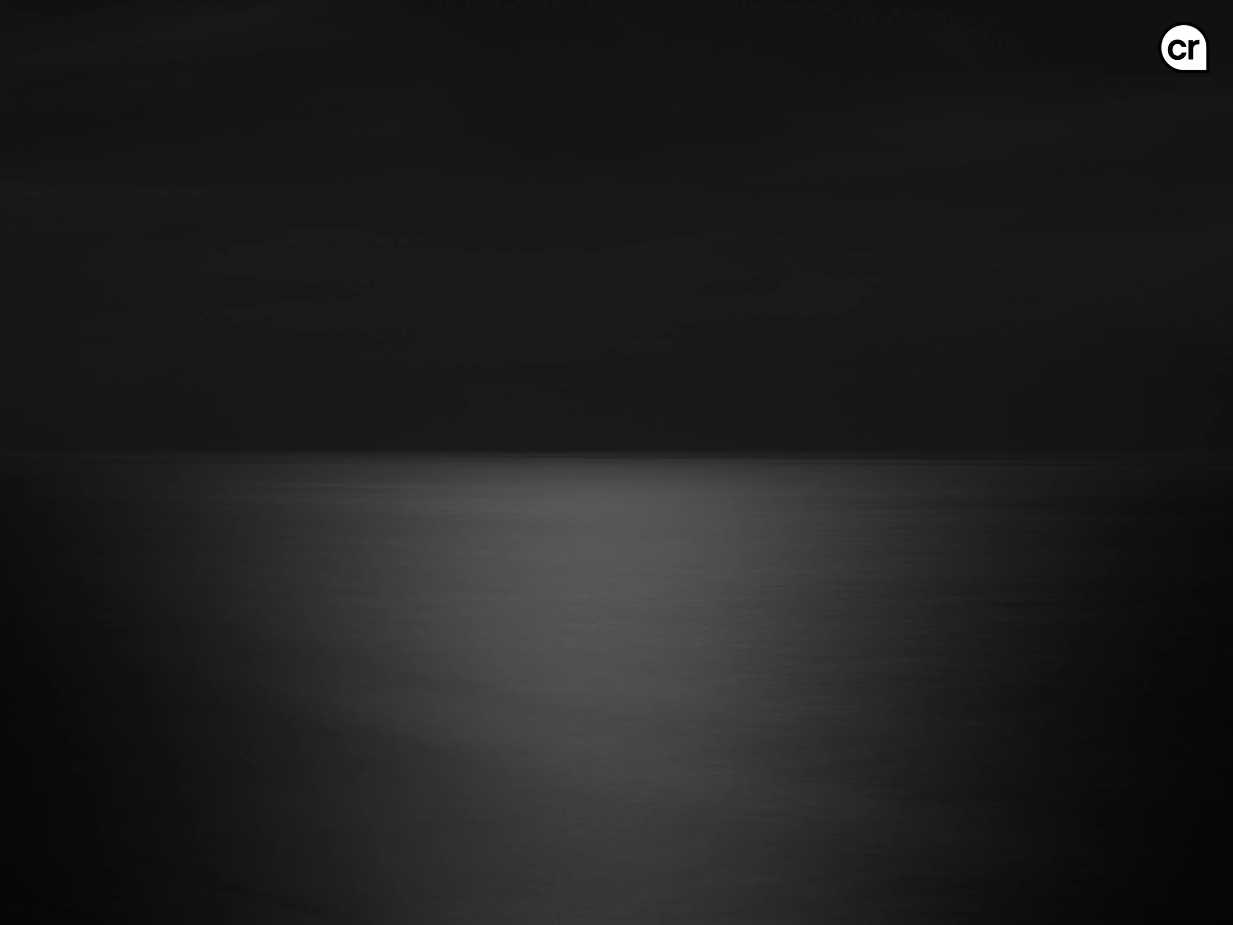 Black and white photograph of the moonlight on the Atlantic Ocean, Lisbon, Portugal. Made by Indigenous Design and Photography Ltd.