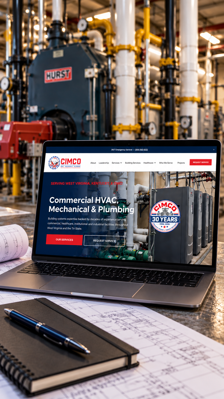 CIMCO commercial HVAC, mechanical and plumbing website displayed on a laptop in an industrial mechanical room.