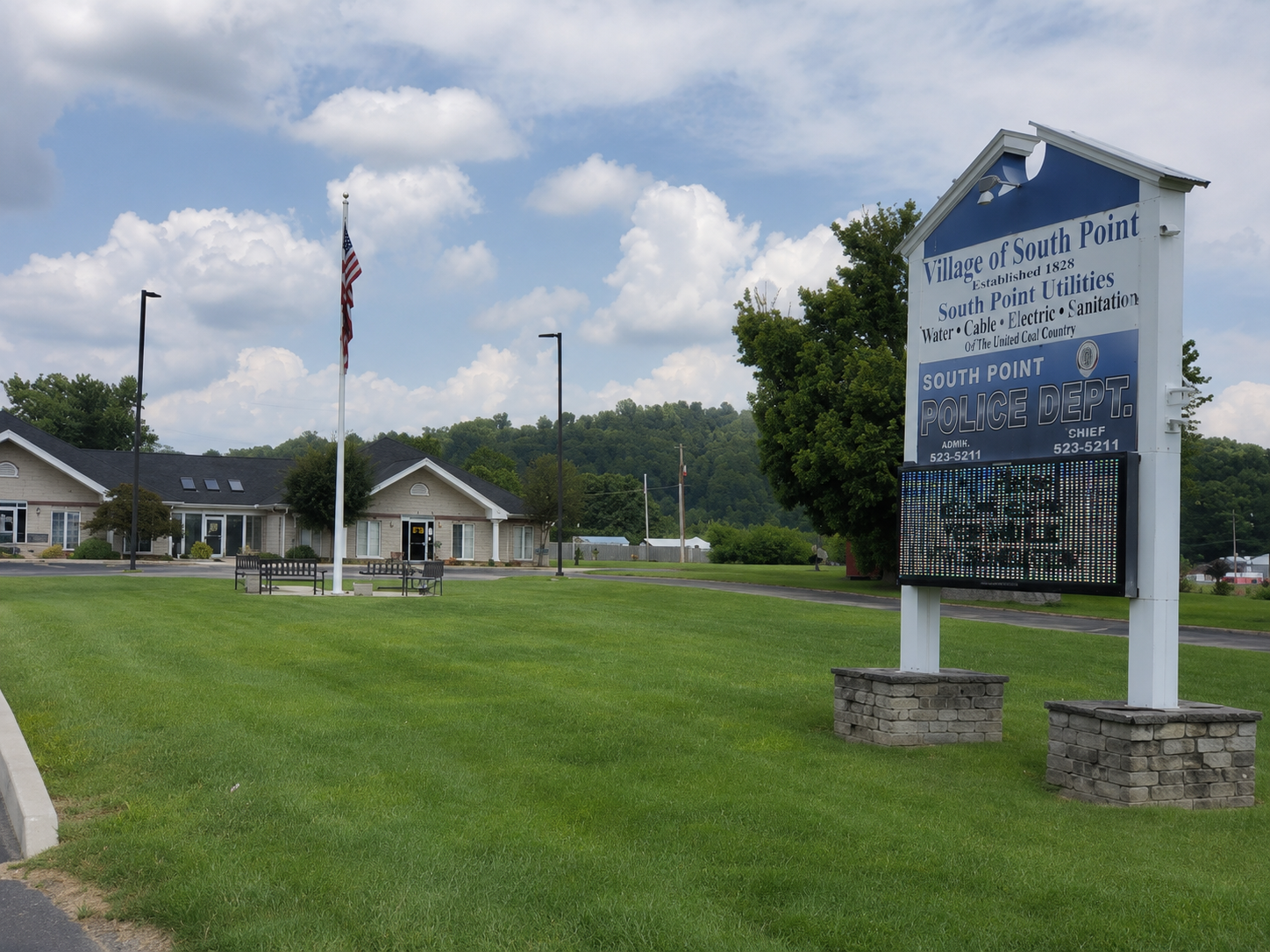 Village of South Point municipal offices and welcome sign in South Point, Ohio, home of Adkins Construction Group