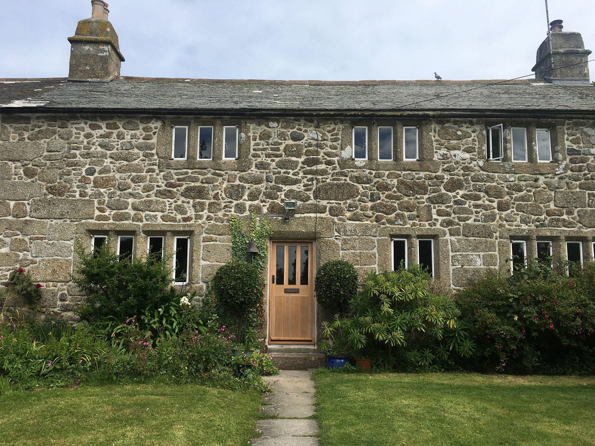 House with traditional timber doors and windows
