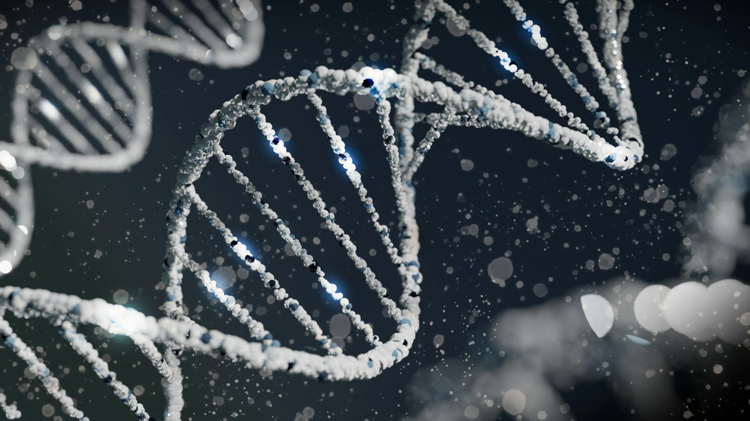 Close-up of a DNA double helix model with white and black beads, illuminated against a dark background with floating particles