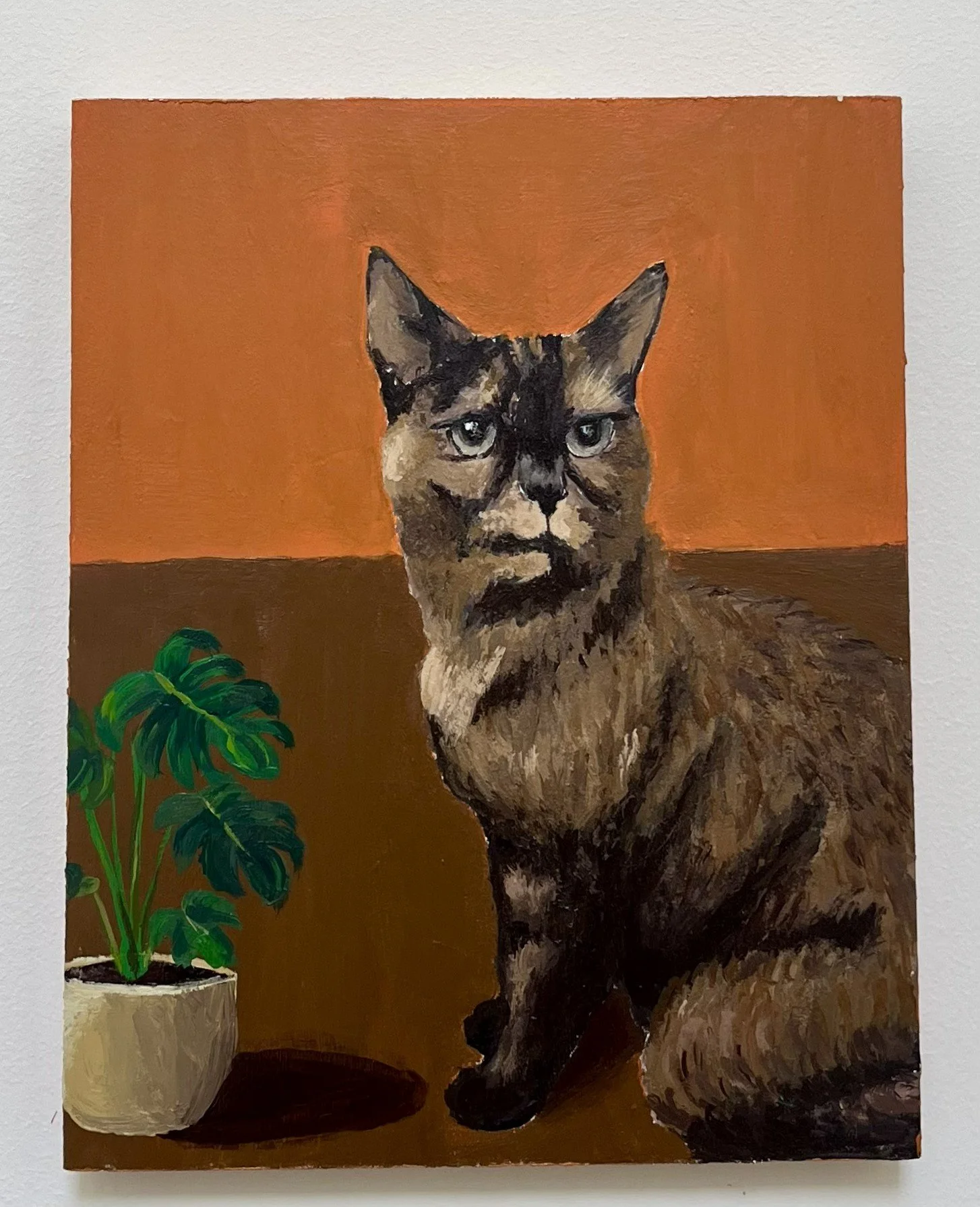 Painting of a Siamese cat sitting beside a potted plant with large green leaves against a brown background.