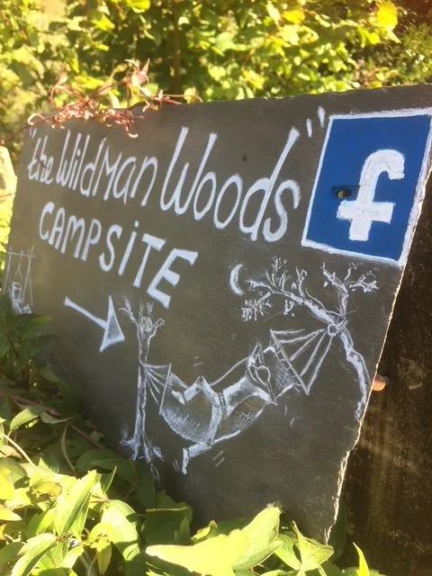 Chalk sign pointing the way to the campsite