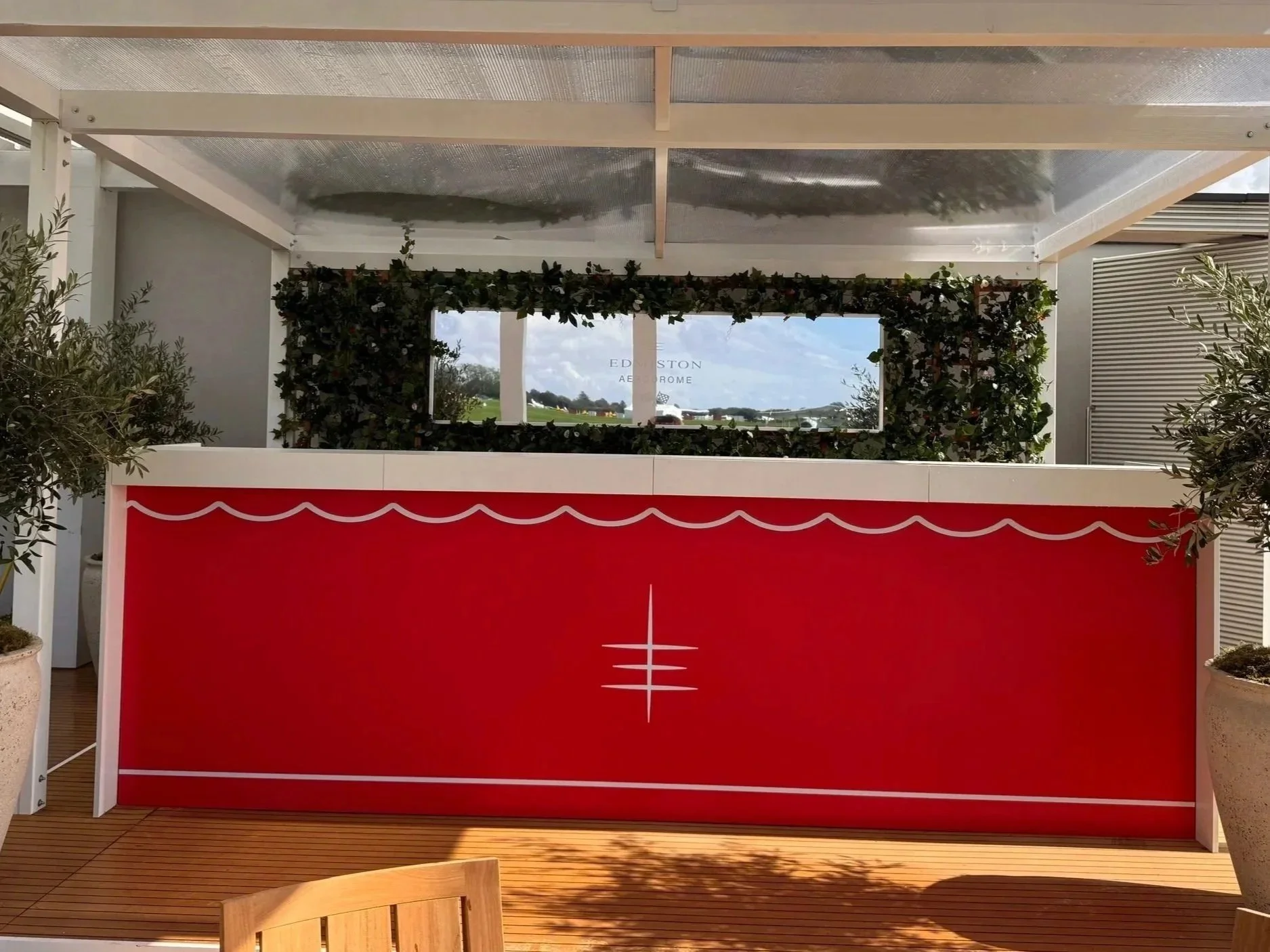 branded mobile bar hire package with scenic decoration and back bar counter.jpg