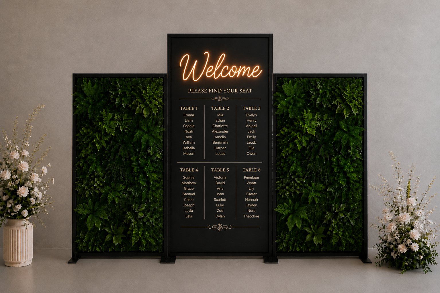 Event decoration- A faux green welcome wall, can be used for seating plans at weddings, brand activations, on a corporate event stand.