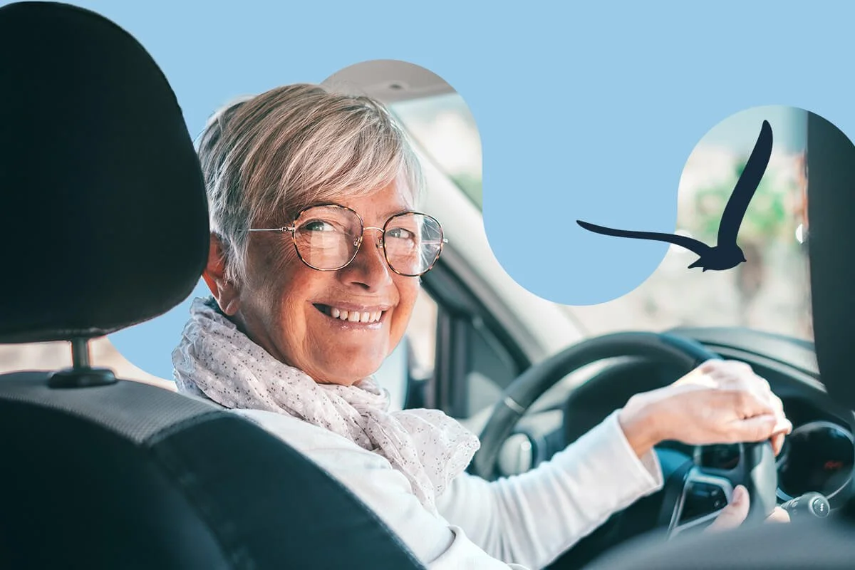 Femmes bénévole au volant d'une voiture