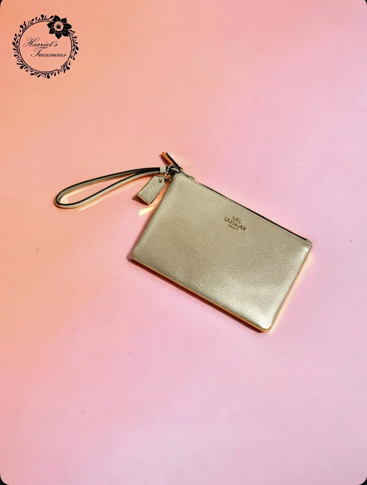 Metallic Champagne Coach Wristlet