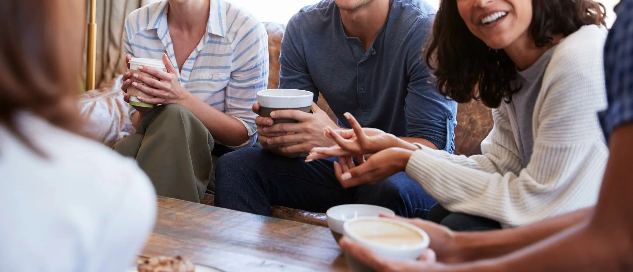 Friends having coffee and talking