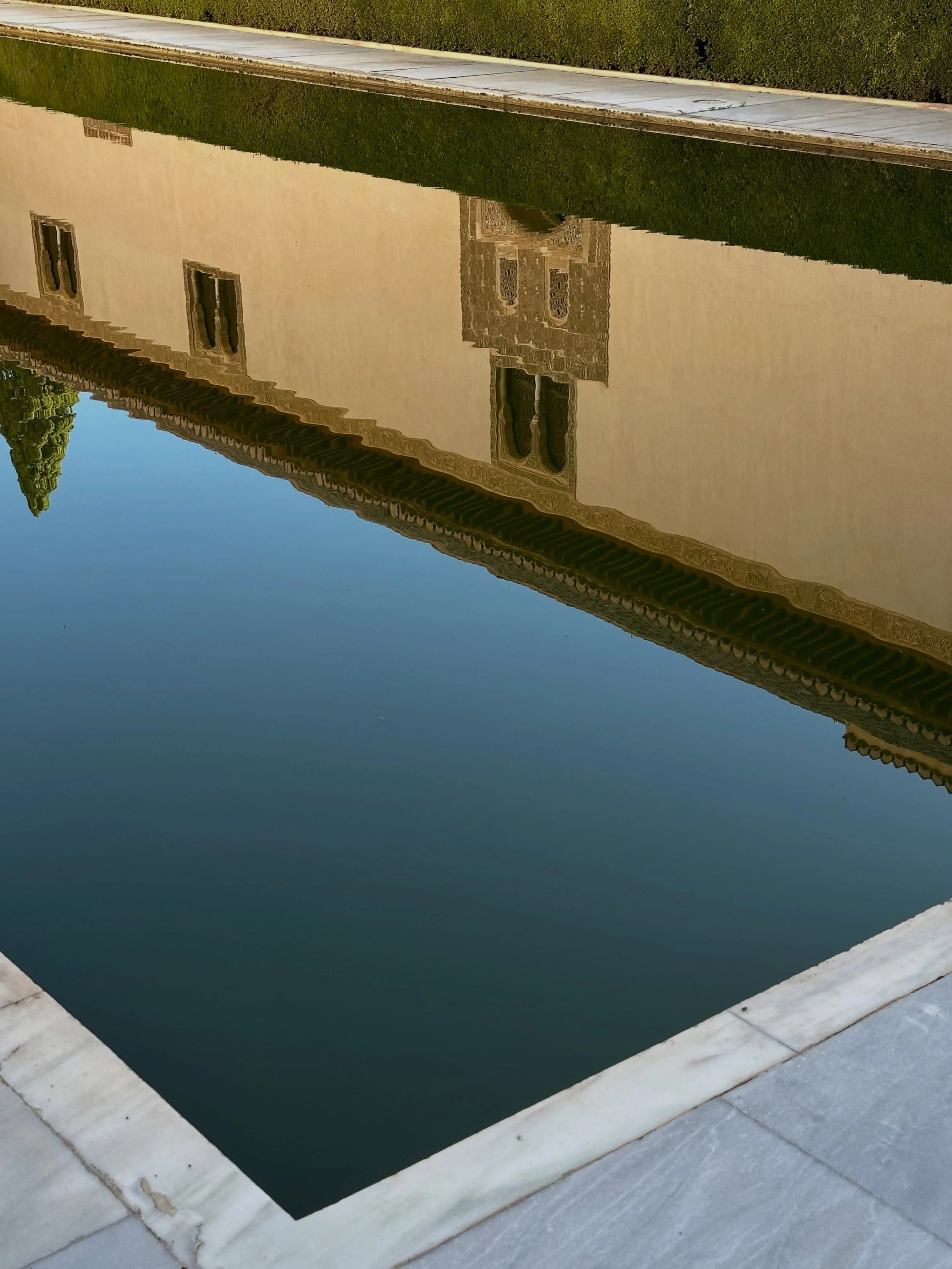 Reflections at the Alhambra which means The Red in Islamic.  #architecture #moorishdesign #granadaespa&ntilde;a #designerdeb