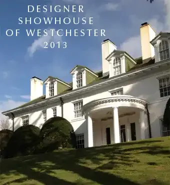 White architect-designed mansion with multiple chimneys and a curved porch, set on a grassy hill, under a partly cloudy sky.