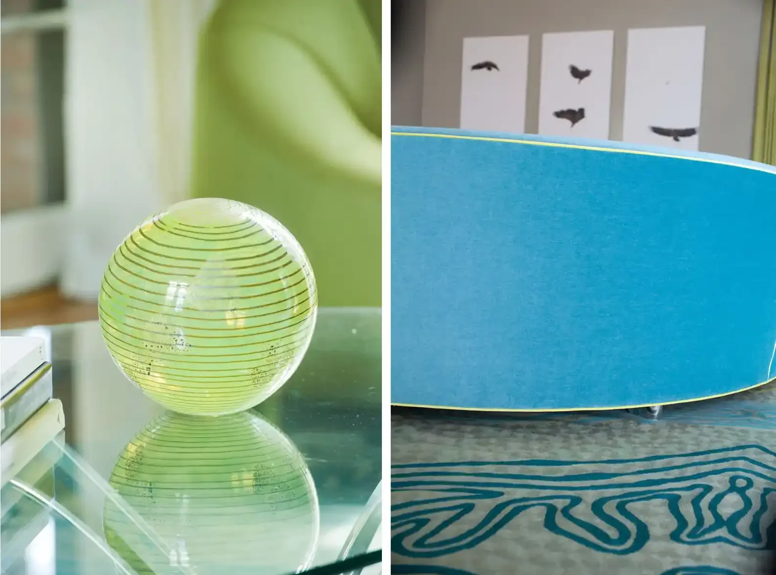 Left side: a decorative glass sphere with black and yellow concentric circle patterns, sitting on a reflective surface in a room with a green wall. Right side: a blue surfboard standing on a patterned gray carpet with three black and white abstract a