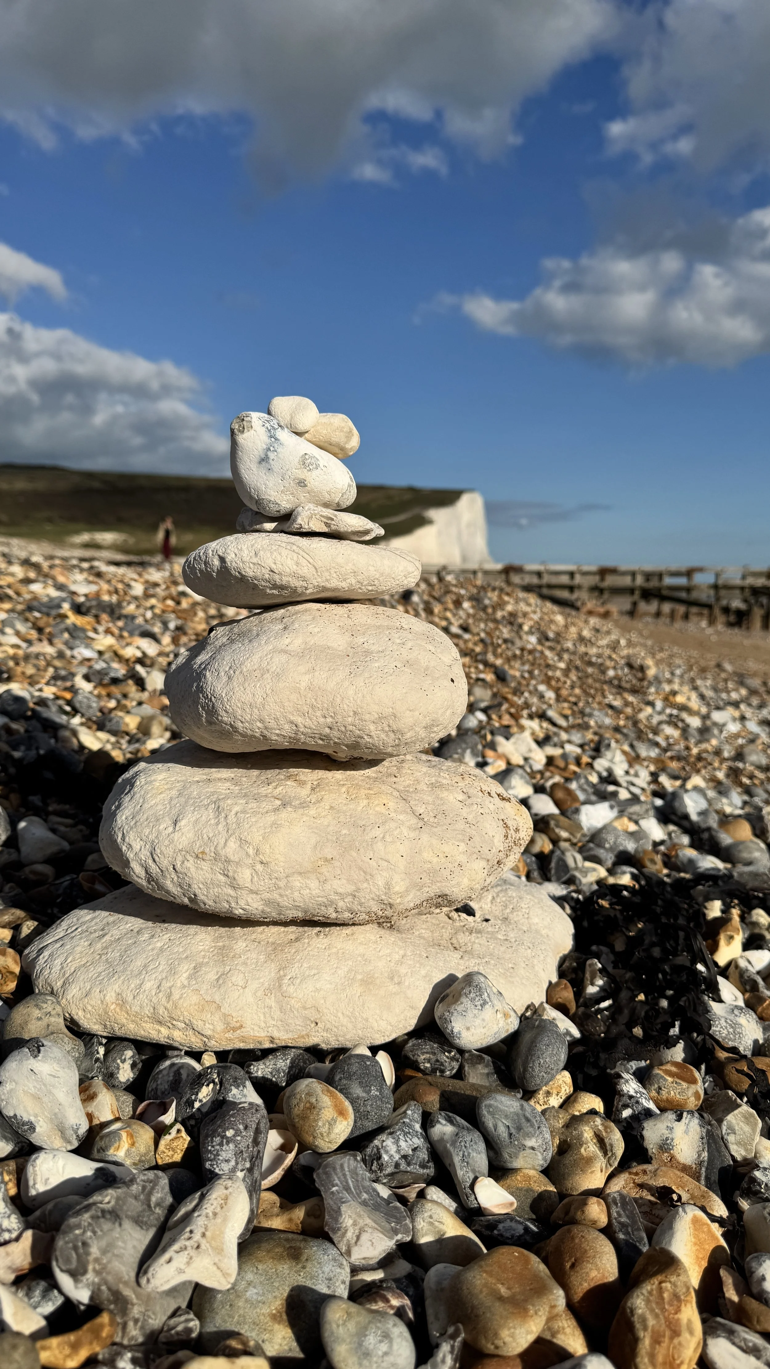 How to rebuild your future, one step at a time represented by blocks of chalk found on the beach at Seven Sisters