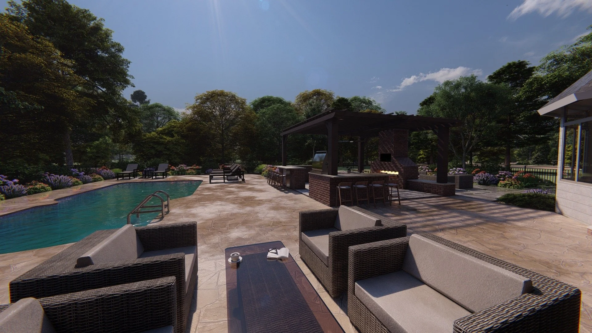 Outdoor pool area with lounge chairs, a covered patio with a brick outdoor fireplace, and surrounding trees and colorful flowers.