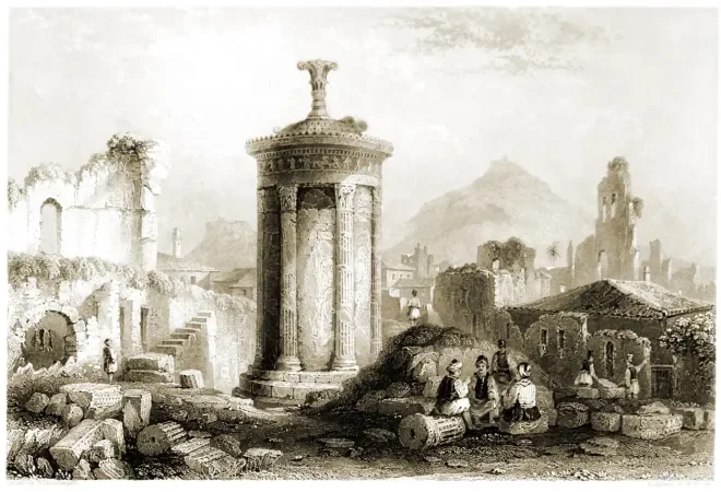 Black and white drawing of ruins with a large classical columned structure at the center, surrounded by smaller ruins and a group of people in the foreground.