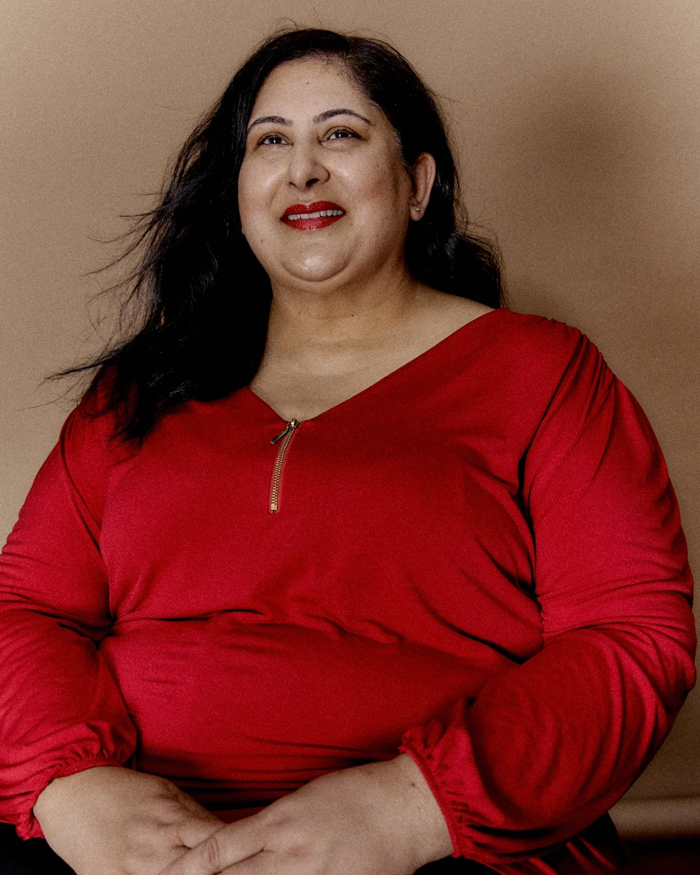Priti portrait mid length seated.jpg