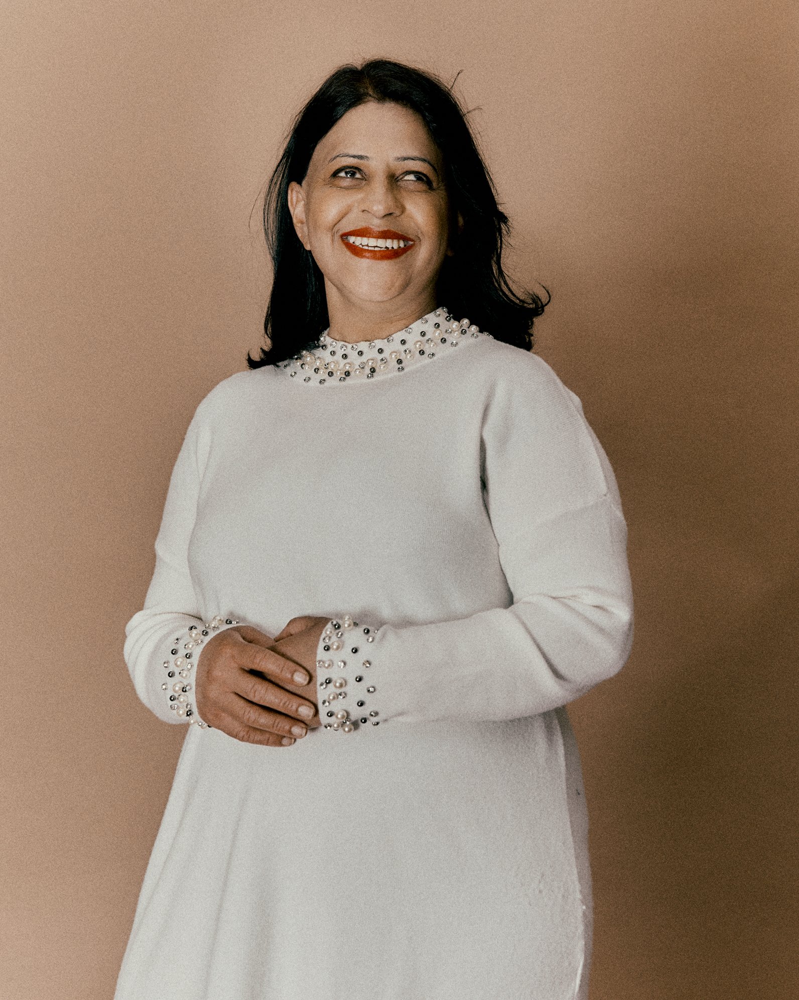 Tahira Portrait full length smiling.jpg