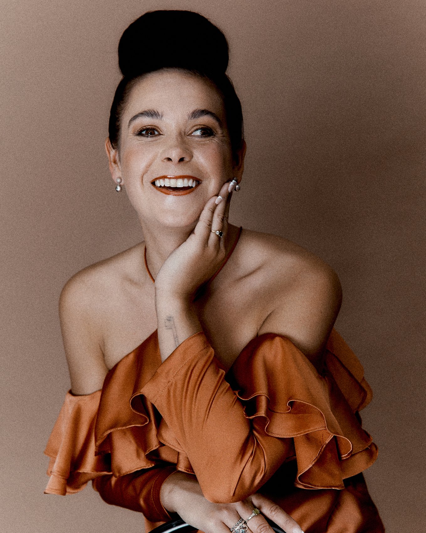 Taylor Portrait Side on Seated laughing.jpg