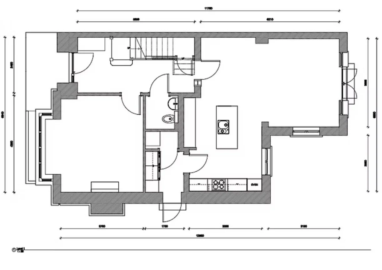Floor plan of a house showing rooms, walls, doors, and windows, with measurements for each section.