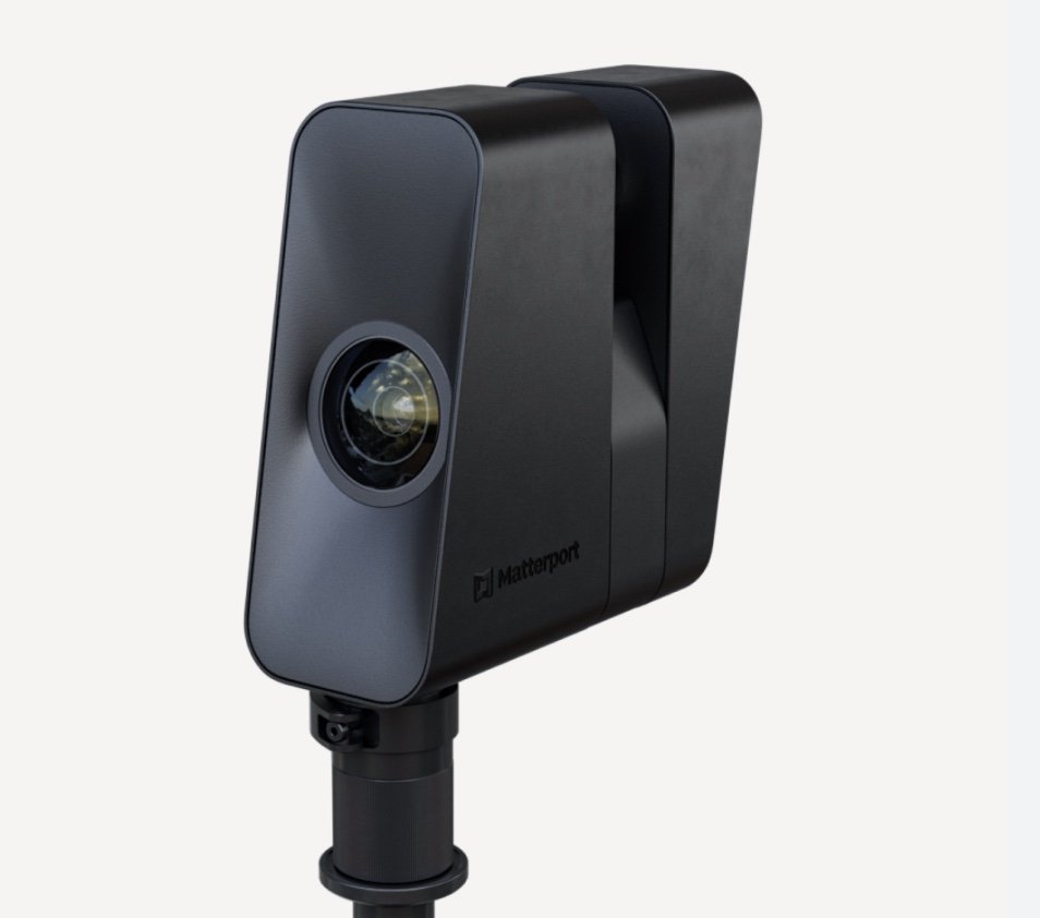 A black 3D laser scanner with a round lens, mounted on a pole, branded 'Matterport', against a plain white background.