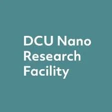 Sign that reads 'DCU Nano Research Facility' on a teal background.