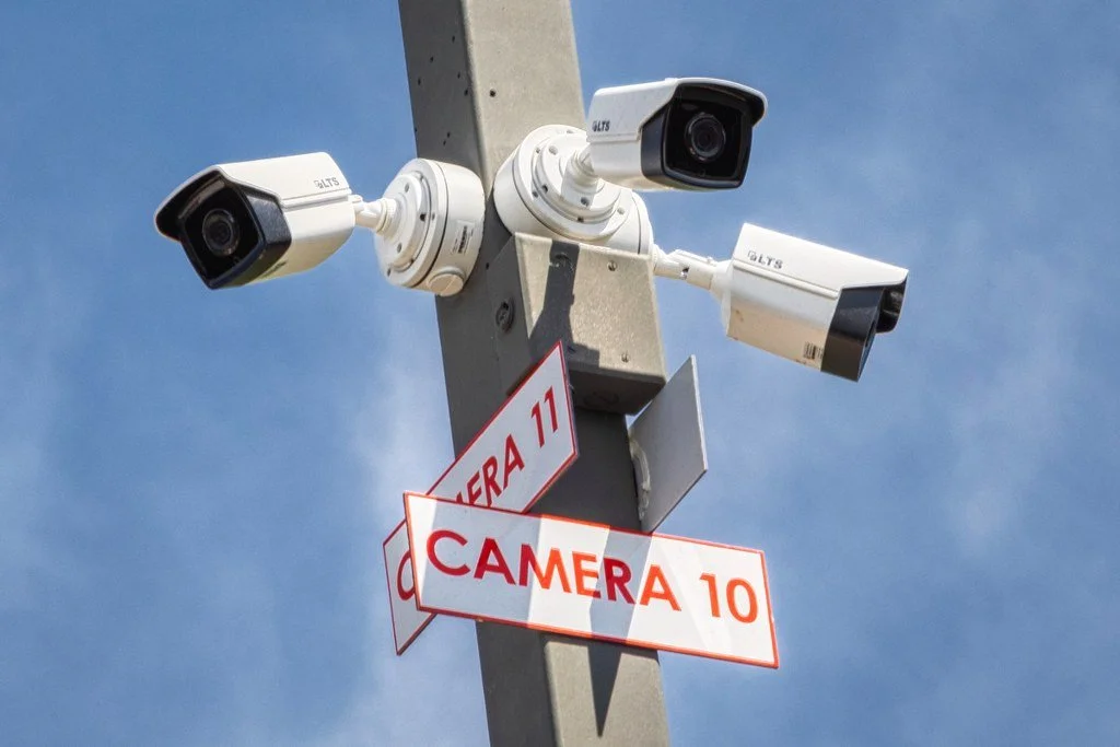 Numbered HD security cameras (Camera 10 and 11) monitoring the Apache Junction RV storage facility
