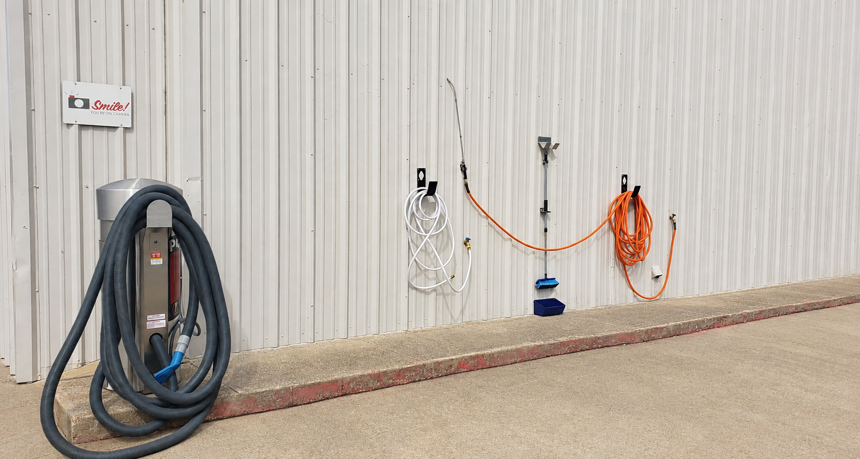 Free wash bay hoses and commercial vacuum station for RV and boat owners at Wylie Bargain Storage